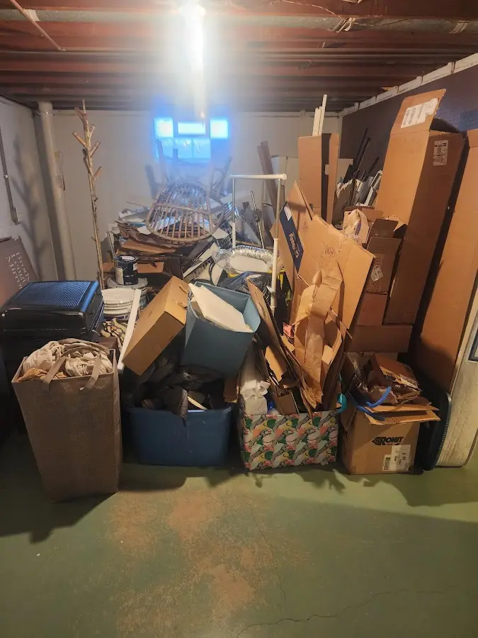 Roll-off dumpster container at job site for Yard Waste Dumpster Rental in Laramie